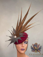 Load image into Gallery viewer, Bianca - Burgundy wool base with an array of golden pheasant and guinea fowl feathers

